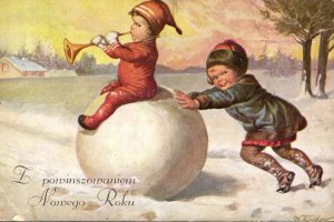 zimowe zabawy dzieci, śnieg, śpiew i sanki