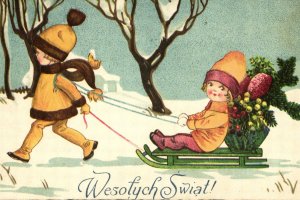 zimowe zabawy dzieci, śnieg, śpiew i sanki